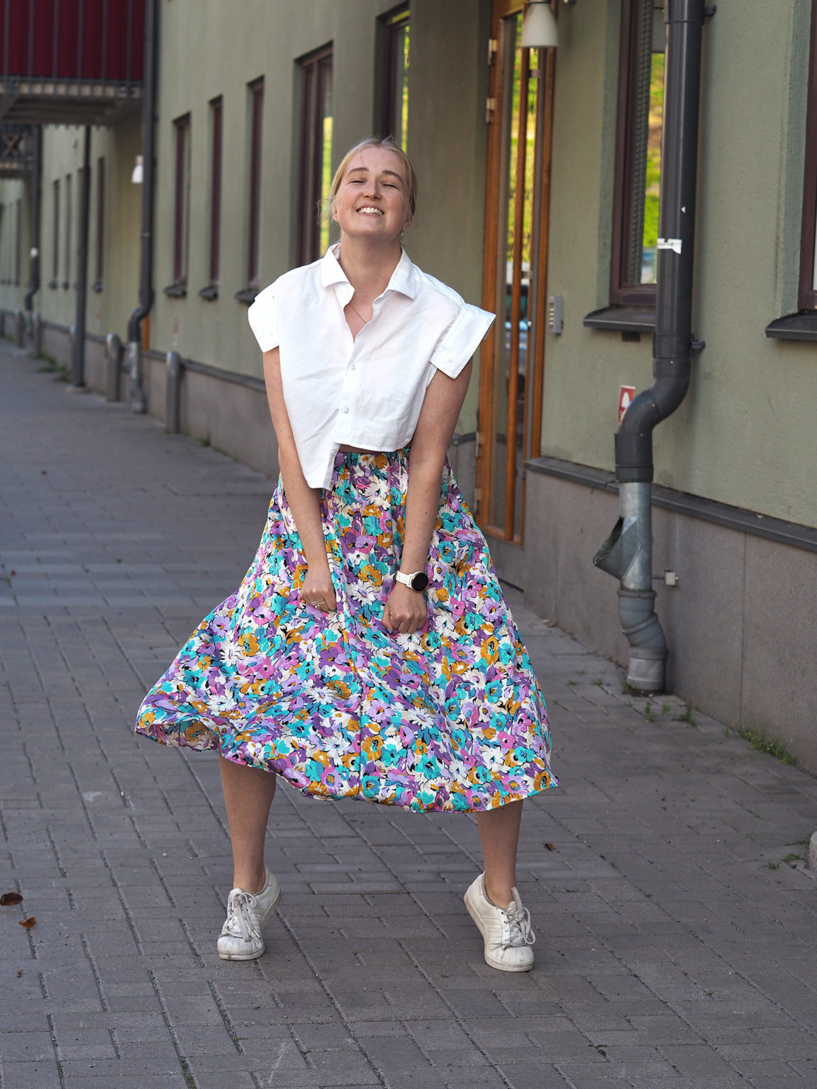 Laughing in flower skirt